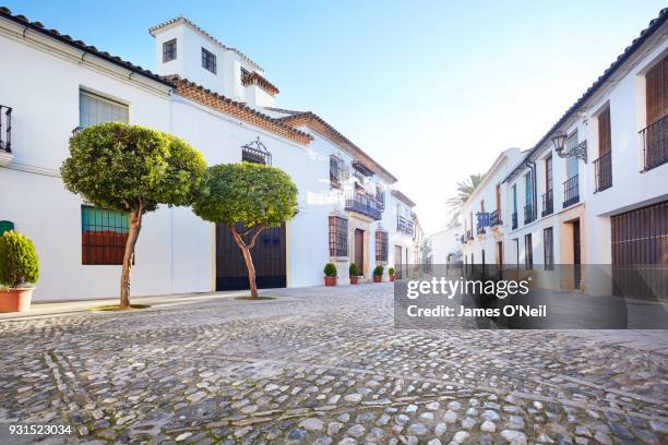 empty backroad in spanish town, ronda, spain - andalucia stock pictures, royalty-free photos & images