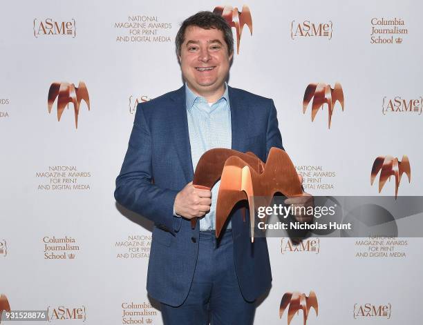 Editor in Chief of Time Magazine Edward Felsenthal poses with an award during the Ellie Awards 2018 on March 13, 2018 in New York City.