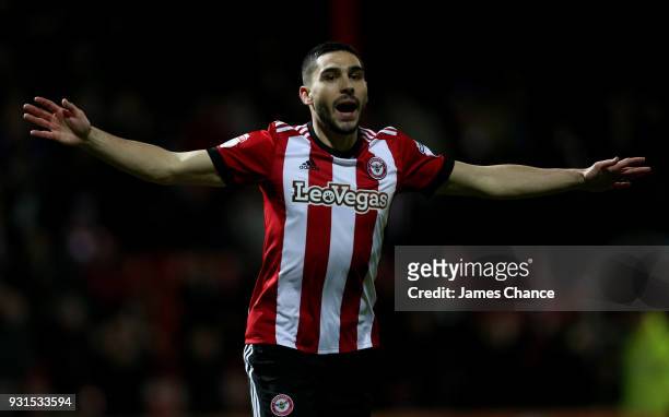 Neal Maupay of Brentford celebrates after scoring his sides first goal during the Sky Bet Championship match between Brentford and Cardiff City at...