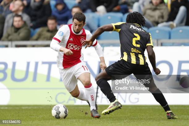 Amin Younes of Ajax, Fankaty Dabo of Vitesse during the Dutch Eredivisie match between Vitesse Arnhem and Ajax Amsterdam at Gelredome on March 04,...