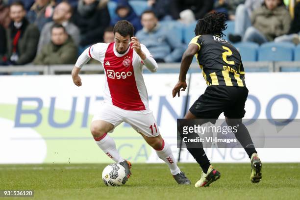Amin Younes of Ajax, Fankaty Dabo of Vitesse during the Dutch Eredivisie match between Vitesse Arnhem and Ajax Amsterdam at Gelredome on March 04,...