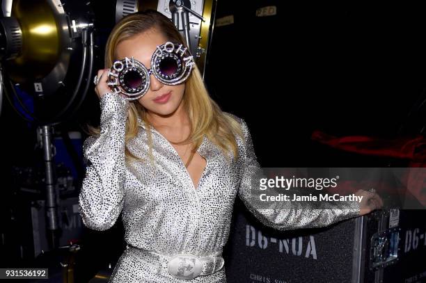 Recording artist Miley Cyrus attends backstage during 60th Annual GRAMMY Awards - I'm Still Standing: A GRAMMY Salute To Elton John at the Theater at...