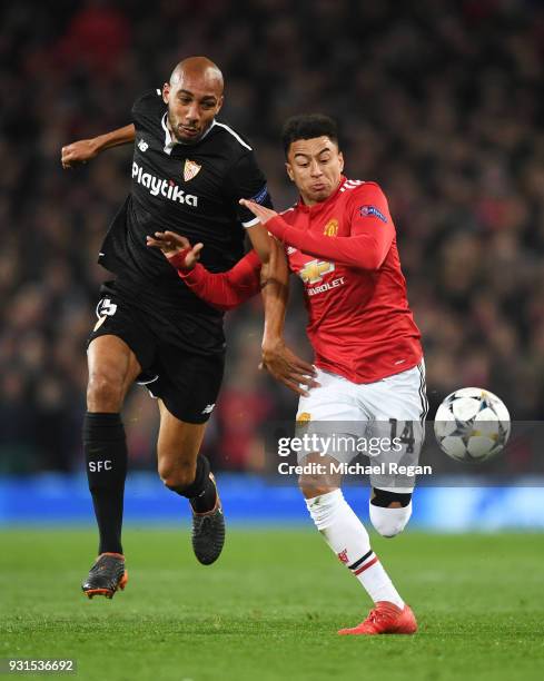 Jesse Lingard of Manchester United and Steven N'Zonzi of Sevilla battle for the ball during the UEFA Champions League Round of 16 Second Leg match...