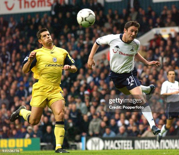 Robbie Keane of Tottenham Hotspur and Anthony Barness of Bolton Wanderers in action during the FA Barclaycard Premiership match between Tottenham...