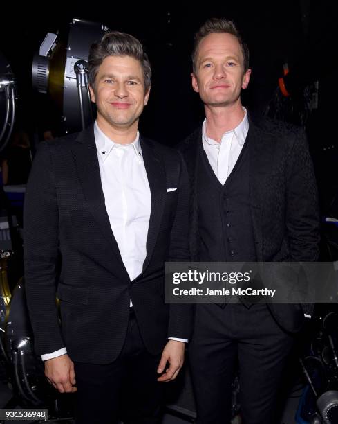 David Burtka and Neil Patrick Harris attend backstage during 60th Annual GRAMMY Awards - I'm Still Standing: A GRAMMY Salute To Elton John at the...