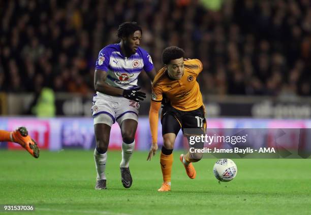 Tyler Blackett of Reading and Helder Costa of Wolverhampton Wanderers during the Sky Bet Championship match between Wolverhampton Wanderers and...