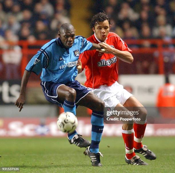 Shaun Goater of Manchester City holds off Mark Fish of Charlton Athletic during the FA Barclaycard Premiership match between Charlton Athletic and...