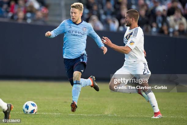 March 11: Anton Tinnerholm of New York City challenged by Perry Kitchen of Los Angeles Galaxy during the New York City FC Vs LA Galaxy regular season...