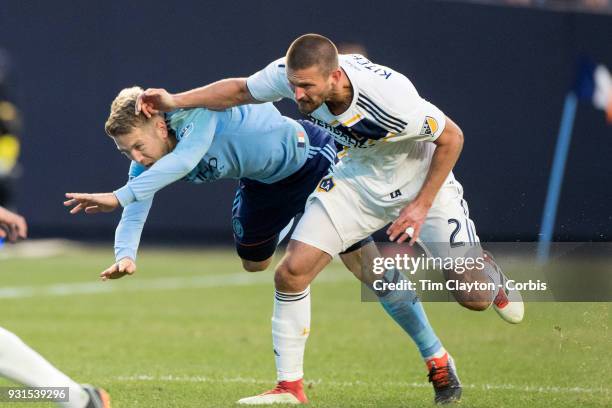 March 11: Anton Tinnerholm of New York City challenged by Perry Kitchen of Los Angeles Galaxy during the New York City FC Vs LA Galaxy regular season...
