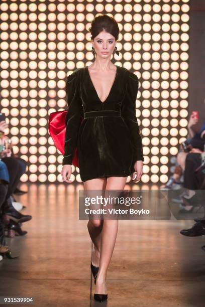 Model walks the runway during the Beso Tura fashion show at Mercedes Benz Fashion Week Russia Fall/Winter 2018/19 at Flacon Factory on March 12, 2018...