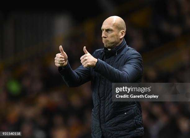 Jaap Stam of Reading gives out instructions to his players during the Sky Bet Championship match between Wolverhampton Wanderers and Reading at...