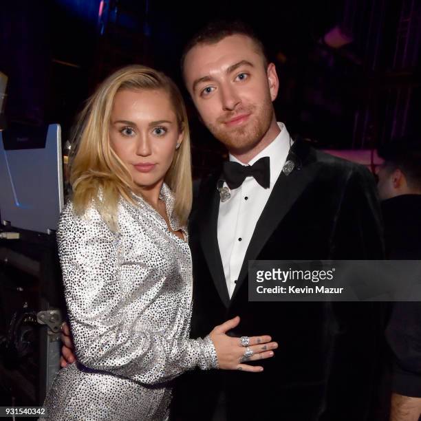 Recording artists Miley Cyrus and Sam Smith attend backstage during 60th Annual GRAMMY Awards - I'm Still Standing: A GRAMMY Salute To Elton John at...