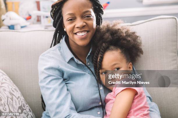 mother and daughter portrait - marilyn nieves stock pictures, royalty-free photos & images