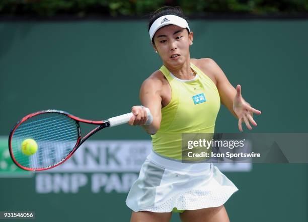 Tennis player Qiang Wang returns a shot in the second set of a match played at the BNP Paribas Open on March 13, 2018 at the Indian Wells Tennis...