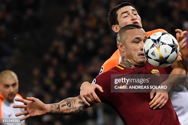 Roma's Belgian midfielder Radja Nainggolan fights for the ball with Shakhtar Donetsk's Ukrainian midfielder Taras Stepanenko during the UEFA...