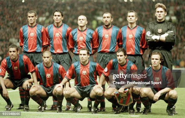 Barcelona line up for a group photo before the UEFA Champions League match between Manchester United and Barcelona at Old Trafford on September 16,...