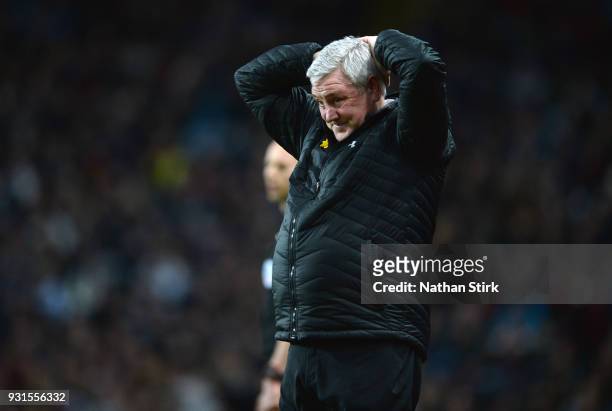 Steve Bruce manager of Aston Villa holds his hands on his head during the Sky Bet Championship match between Aston Villa and Queens Park Rangers at...