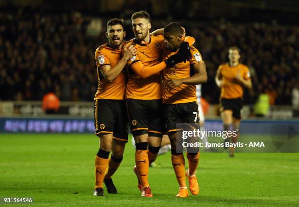 Matt Doherty of Wolverhampton Wanderers celebrates with his team mates after scoring a goal to make it 1-0 during the Sky Bet Championship match...