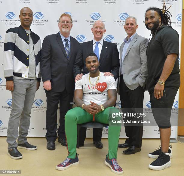 Matt Organ, Jason Derulo, Brian Quail President/Chief Executive Officer of Boys & Girls Club of Broward County and Joel Desrouleaux pose for picture...
