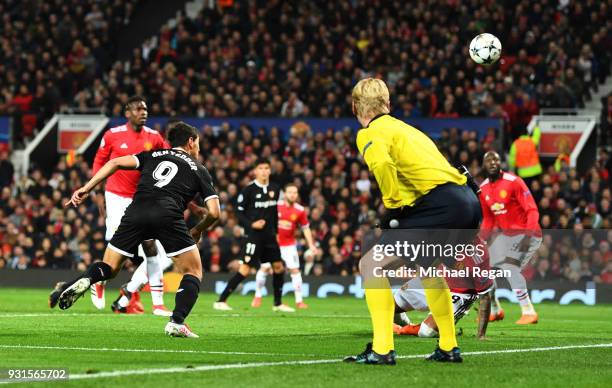 Wissam Ben Yedder of Sevilla scores their second goal during the UEFA Champions League Round of 16 Second Leg match between Manchester United and...