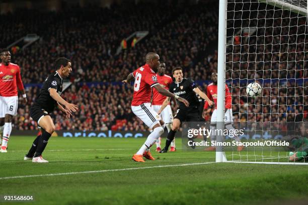 Man Utd goalkeeper David De Gea is unable to stop Wissam Ben Yedder of Sevilla scoring his 2nd goal during the UEFA Champions League Round of 16...