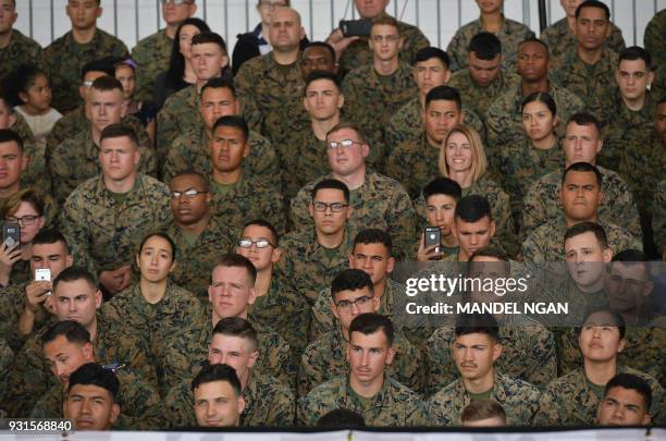 Marines listen to US President Donald Trump speak to military personnel at Marine Corps Air Station Miramar in San Diego, California on March 13,...