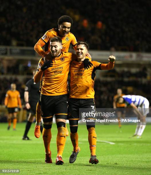 Wolverhampton Wanderers' Matt Doherty celebrates scoring his side's third goal of the game with Barry Douglas during the Sky Bet Championship match...