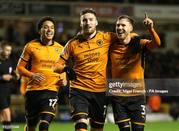 Wolverhampton Wanderers' Matt Doherty celebrates scoring his side's third goal of the game with Helder Costa and Barry Douglas during the Sky Bet...