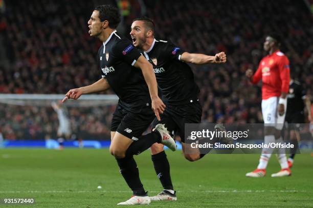 Wissam Ben Yedder of Sevilla celebrates scoring their 1st goal with Pablo Sarabia during the UEFA Champions League Round of 16 Second Leg match...