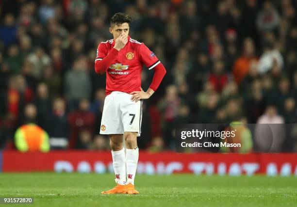 Alexis Sanchez of Manchester United looks despondent during the UEFA Champions League Round of 16 Second Leg match between Manchester United and...