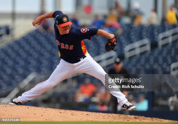 Joe Smith of the Houston Astros in action against the Miami Marlins during a spring training game at Fitteam Ballpark of the Palm Beaches on March 7,...