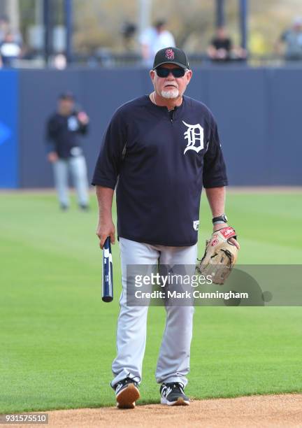 Manager Ron Gardenhire of the Detroit Tigers looks on while wearing a special SD logo baseball hat to honor the Marjory Stoneman Douglas High School...
