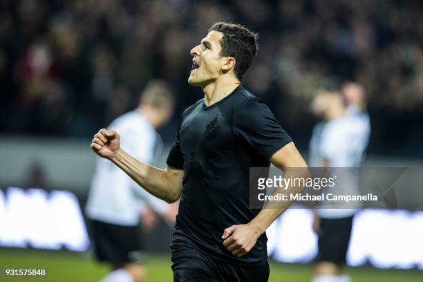 Tarik Elyounoussi of AIK scores the opening goal during a Swedish Cup quarter final match between AIK and Orebro SK at Friends arena on March 13,...