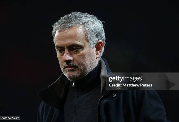 Manager Jose Mourinho of Manchester United walks off after the UEFA Champions League Round of 16 Second Leg match between Manchester United and...