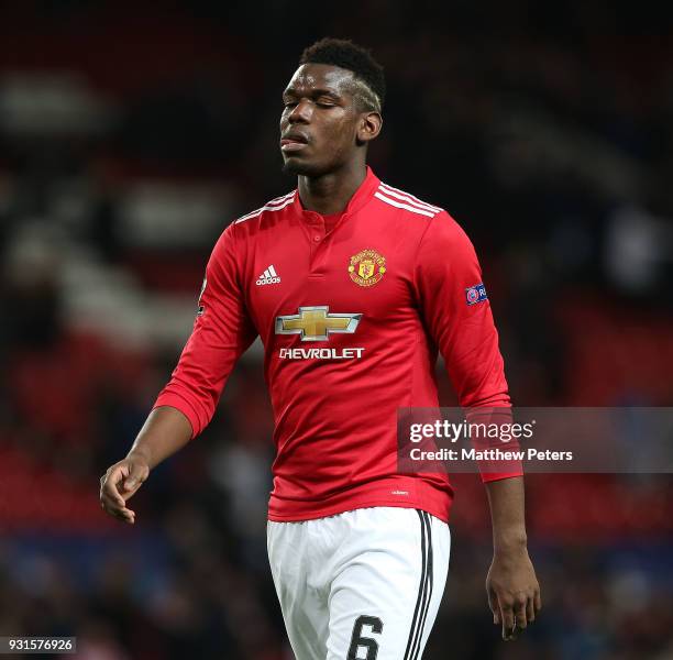 Paul Pogba of Manchester United walks off after the UEFA Champions League Round of 16 Second Leg match between Manchester United and Sevilla FC at...