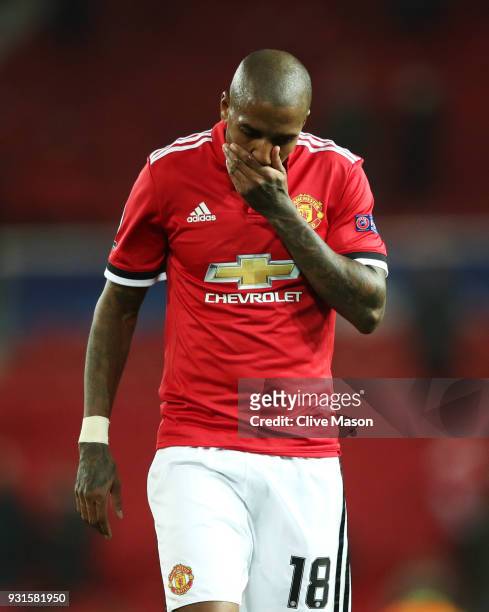 Ashley Young of Manchester United looks dejected in defeat after the UEFA Champions League Round of 16 Second Leg match between Manchester United and...