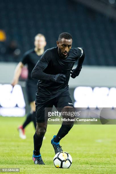 Henok Goitom of AIK runs with the ball during a Swedish Cup quarter final match between AIK and Orebro SK at Friends arena on March 13, 2018 in...