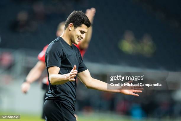 Tarik Elyounoussi of AIK reacts after a missed chance on goal during a Swedish Cup quarter final match between AIK and Orebro SK at Friends arena on...