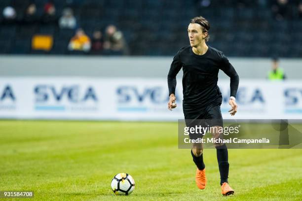 Kristoffer Olsson of AIK runs with the ball during a Swedish Cup quarter final match between AIK and Orebro SK at Friends arena on March 13, 2018 in...