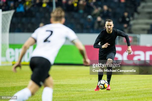 Alexander Milosevic of AIK runs with the ball during a Swedish Cup quarter final match between AIK and Orebro SK at Friends arena on March 13, 2018...