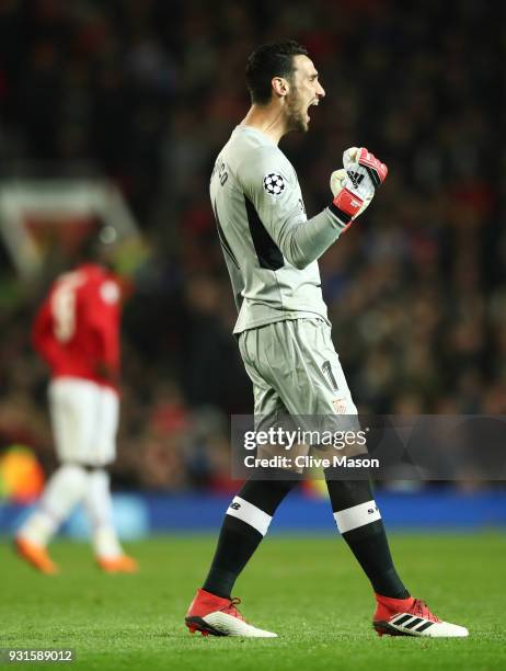 Sergio Rico of Sevilla celebrates during the UEFA Champions League Round of 16 Second Leg match between Manchester United and Sevilla FC at Old...