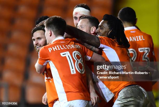 Blackpool's Jimmy Ryan celebrates scoring his side's first goal with his team-mates during the Sky Bet League One match between Blackpool and...