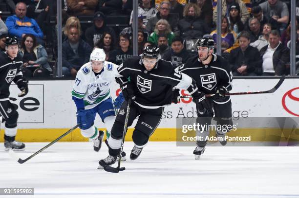 Alex Iafallo of the Los Angeles Kings handles the puck during a game against the Vancouver Canucks at STAPLES Center on March 12, 2018 in Los...