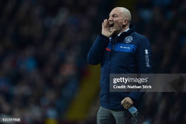 Ian Holloway manager of Queens Park Rangers shouts at his players during the Sky Bet Championship match between Aston Villa and Queens Park Rangers...