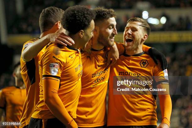 Matt Doherty of Wolverhampton Wanderers celebrates scoring his second goal with Barry Douglas during the Sky Bet Championship match between...