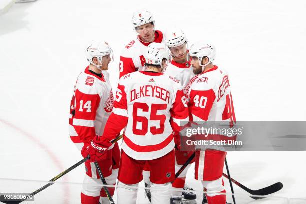 Gustav Nyquist, Justin Abdelkader, Danny DeKeyser, Nick Jensen and Henrik Zetterberg of the Detroit Red Wings talk during a NHL game against the San...