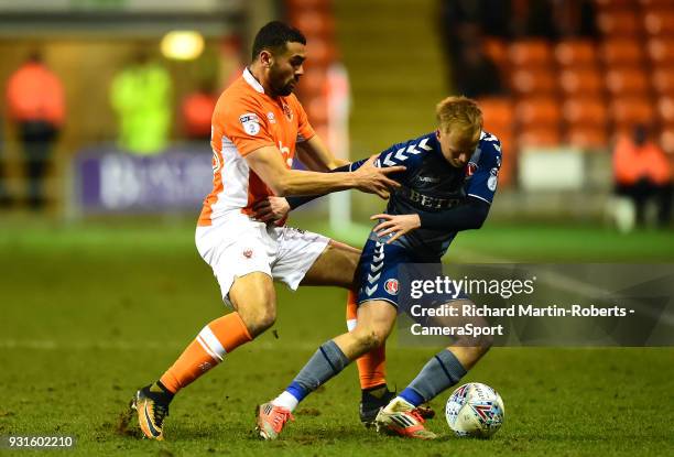 Blackpool's Colin Daniel vies for possession with Charlton Athletic's Ben Reeves during the Sky Bet League One match between Blackpool and Charlton...
