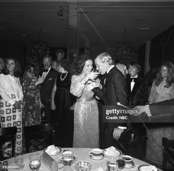 10th Anniversary Party" -- Pictured: Joanna Holland, Johnny Carson Dan Rowan, director Bobby Quinn and wife Tangley Lloyd during the 'Tonight Show...