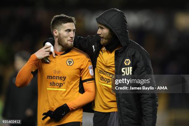 Matt Doherty of Wolverhampton Wanderers and Will Norris of Wolverhampton Wanderers celebrate at full time during the Sky Bet Championship match...