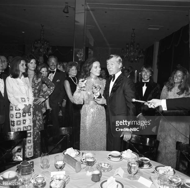 10th Anniversary Party" -- Pictured: Joanna Holland, Johnny Carson Dan Rowan, director Bobby Quinn and wife Tangley Lloyd during the 'Tonight Show...